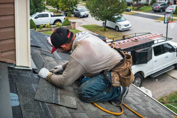 Professional Roofing technician working in Chestnut Hill, MA